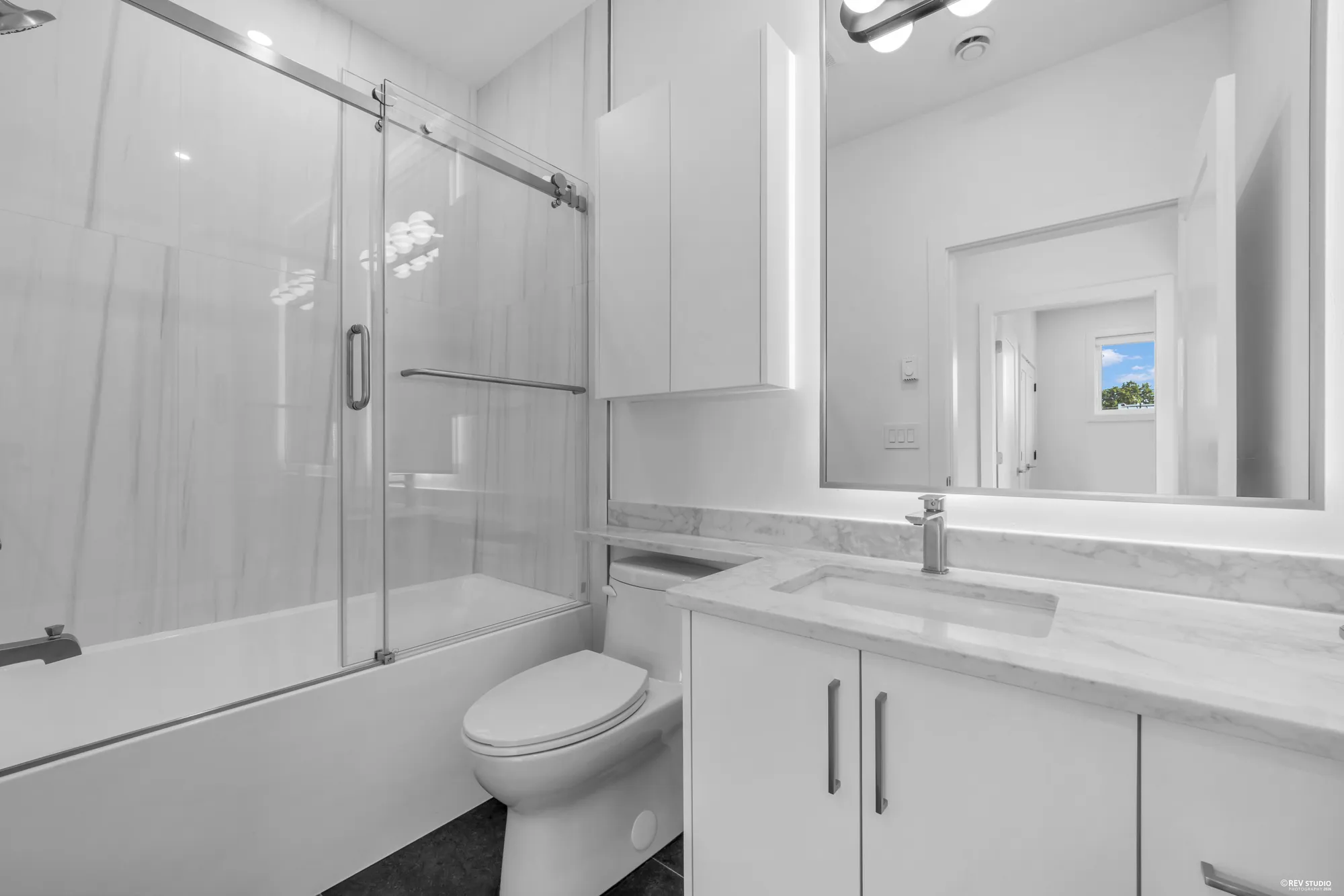 Upstairs bathroom with a tub and shower